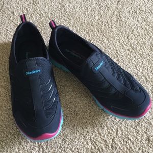 Skechers slip on walking shoes. Size 9.5